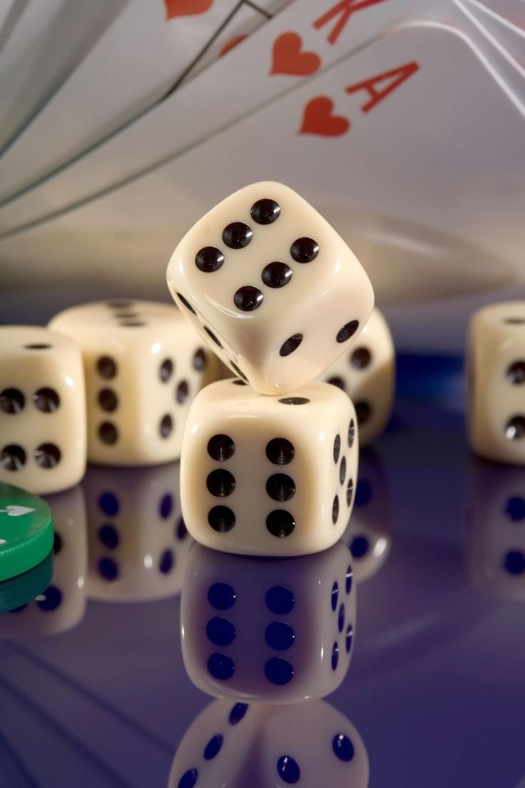 Close-up of paito table showing match status indicators and team names